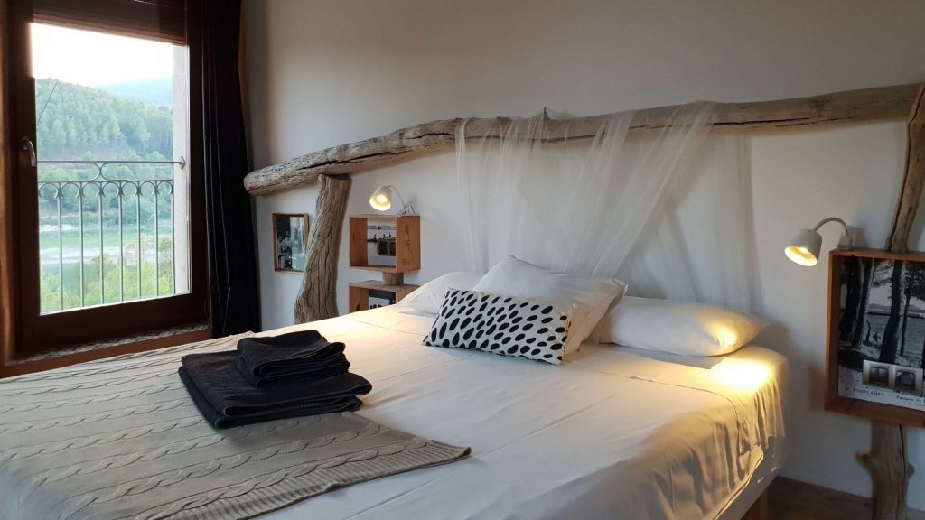 Family room with queen bed and view